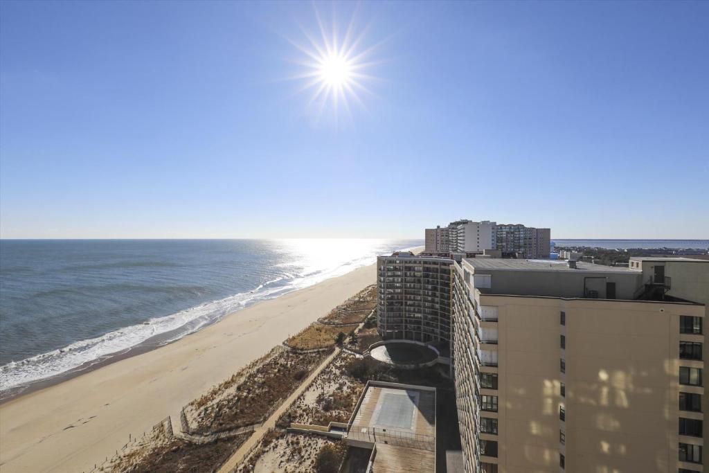 a view of the beach from the balcony of a building at Sea Watch II in Ocean City