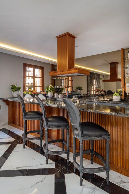 Kuchyň nebo kuchyňský kout v ubytování Hotel Casa Arum