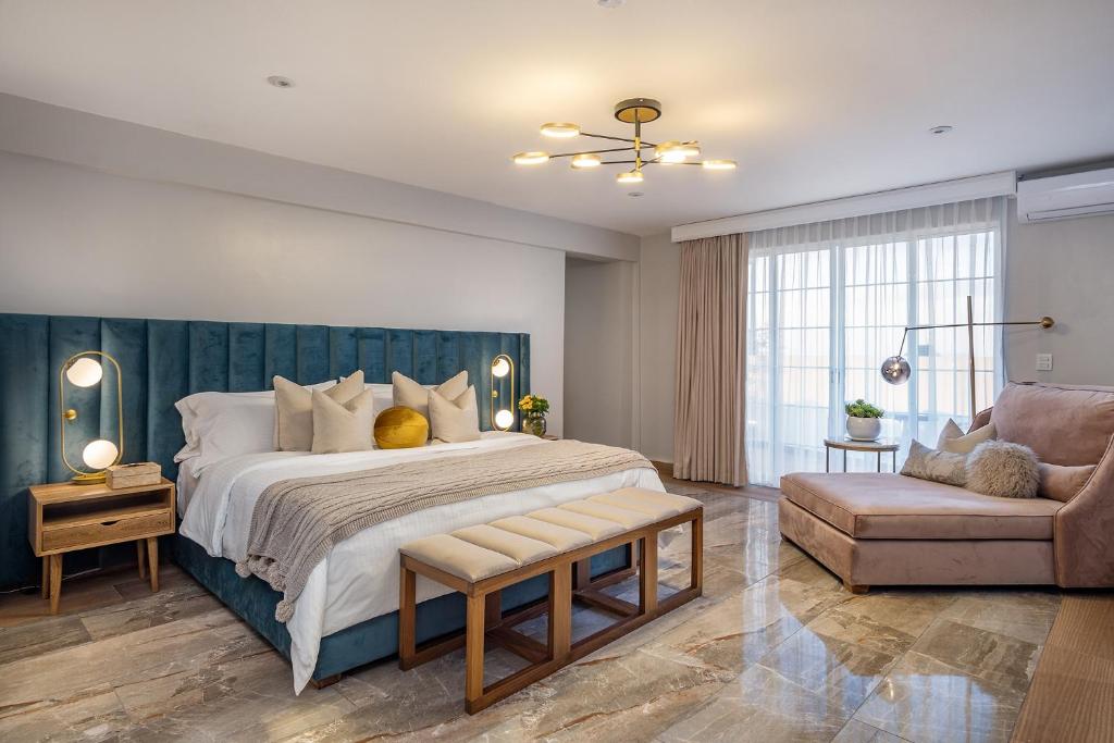 Postel nebo postele na pokoji v ubytování Hotel Casa Arum