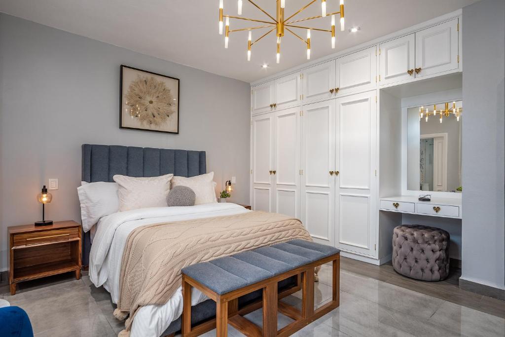 Postel nebo postele na pokoji v ubytování Hotel Casa Arum