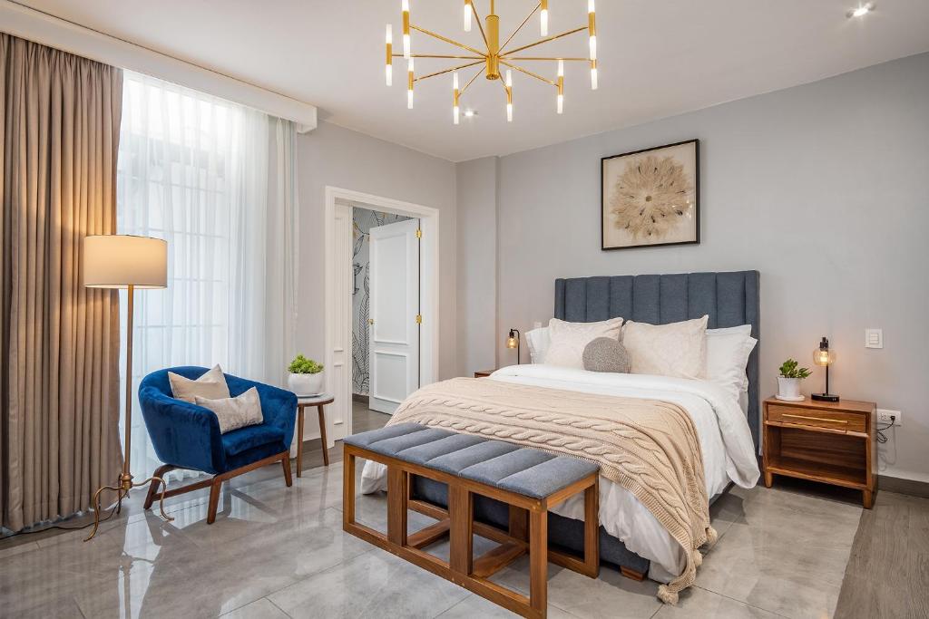 Postel nebo postele na pokoji v ubytování Hotel Casa Arum