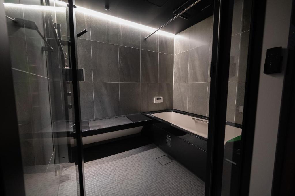 Koupelna v ubytování HOTEL STATE TENNOJI