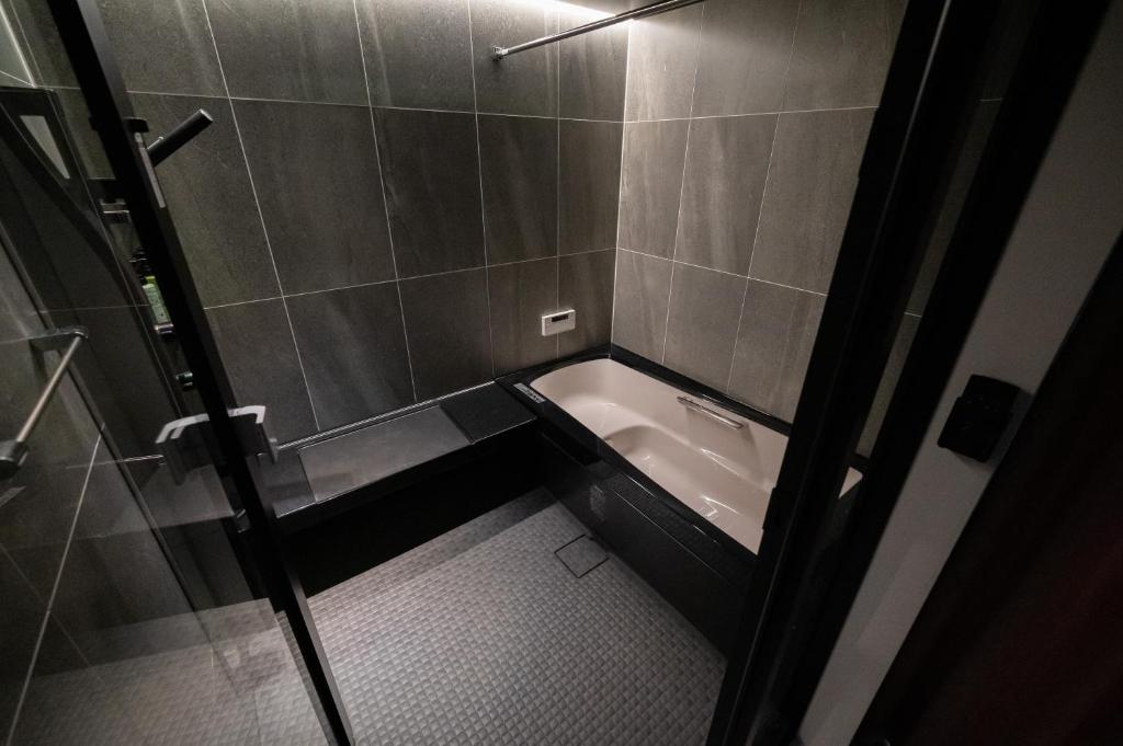 Koupelna v ubytování HOTEL STATE TENNOJI