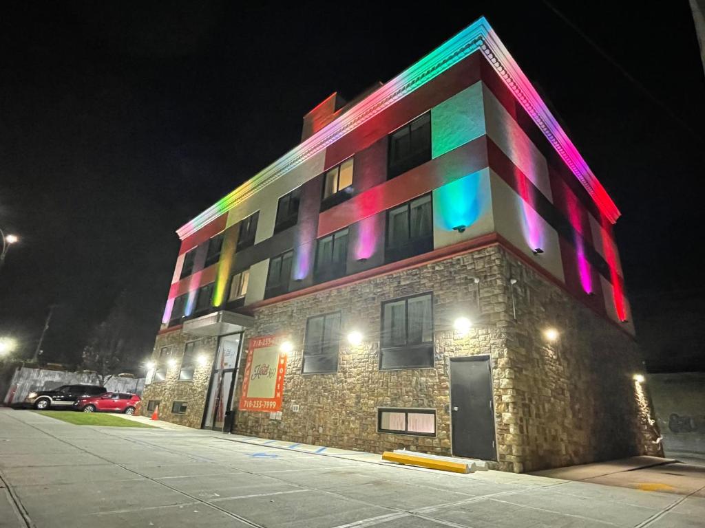 a building with colorful lights on the side of it at Hotel 369 Brooklyn in Brooklyn