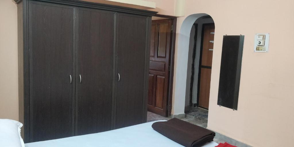 Postel nebo postele na pokoji v ubytování Koito-House calangute guest house