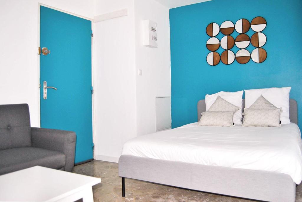 Postel nebo postele na pokoji v ubytování Hôtel le Thurot
