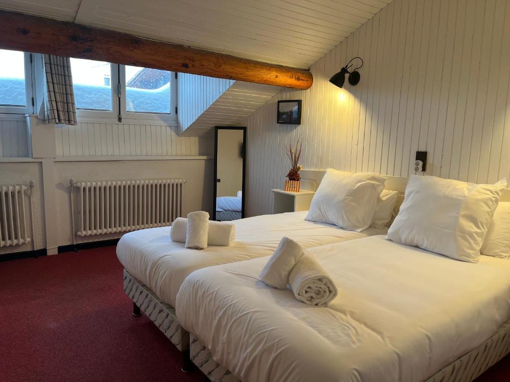 Postel nebo postele na pokoji v ubytování Relais Des Villards
