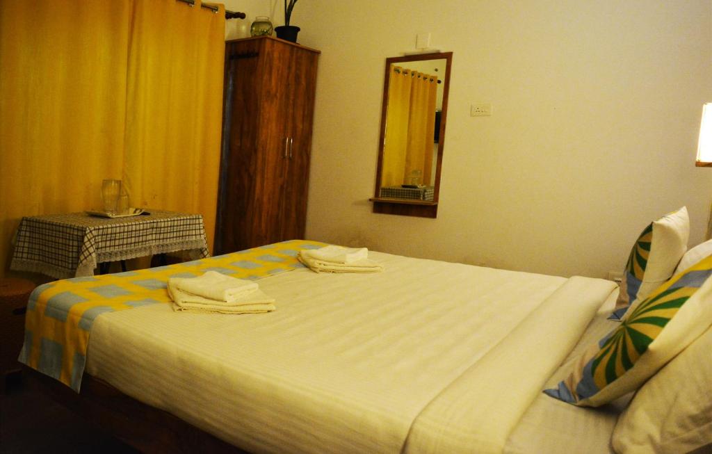 Postel nebo postele na pokoji v ubytování EDEN Paradisee