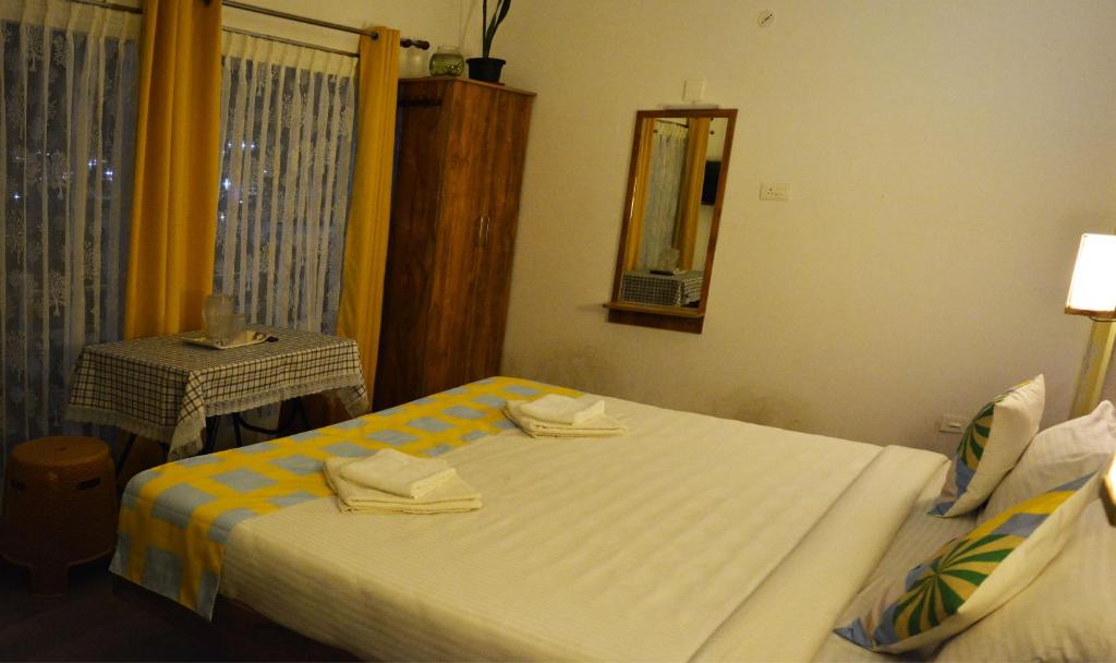 Postel nebo postele na pokoji v ubytování EDEN Paradisee