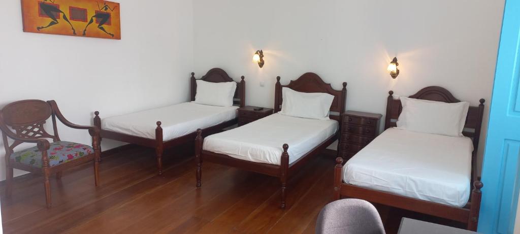 Postel nebo postele na pokoji v ubytování Hotel Savana