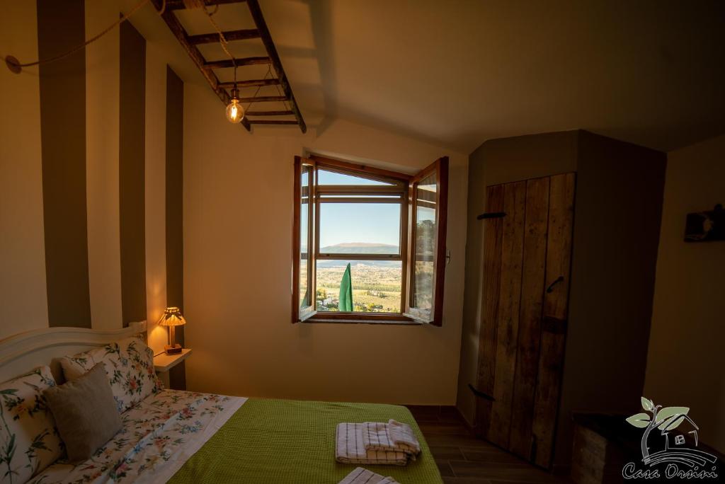 Posteľ alebo postele v izbe v ubytovaní Agriturismo Casa Orsini