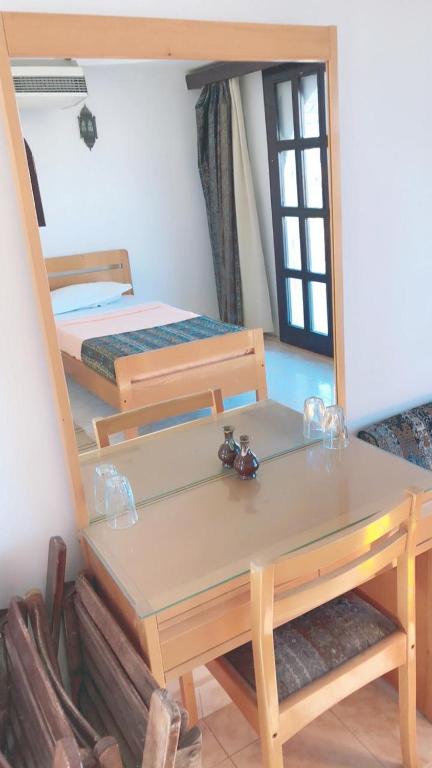A bed or beds in a room at Lagona Dahab Hotel