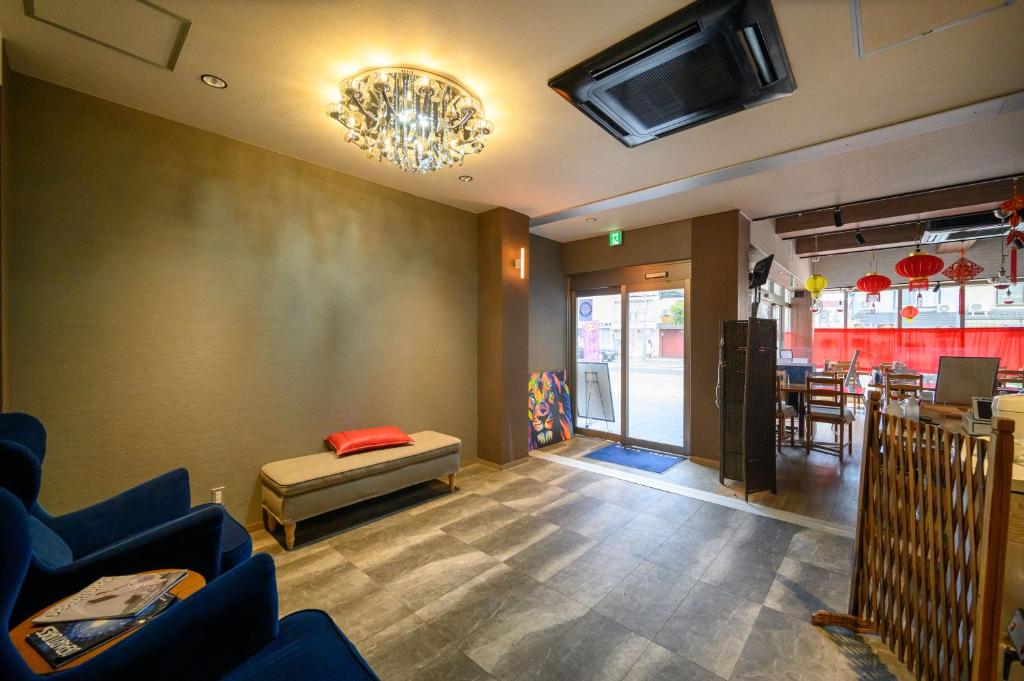 TV a/nebo společenská místnost v ubytování HOTEL STATE TENNOJI
