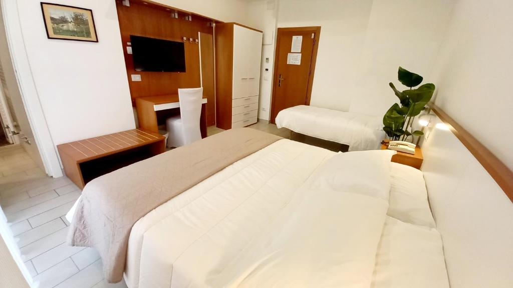 Telewizja i/lub zestaw kina domowego w obiekcie Hotel Brotas