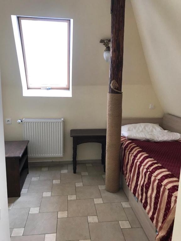 Postel nebo postele na pokoji v ubytování Patkovski Gold