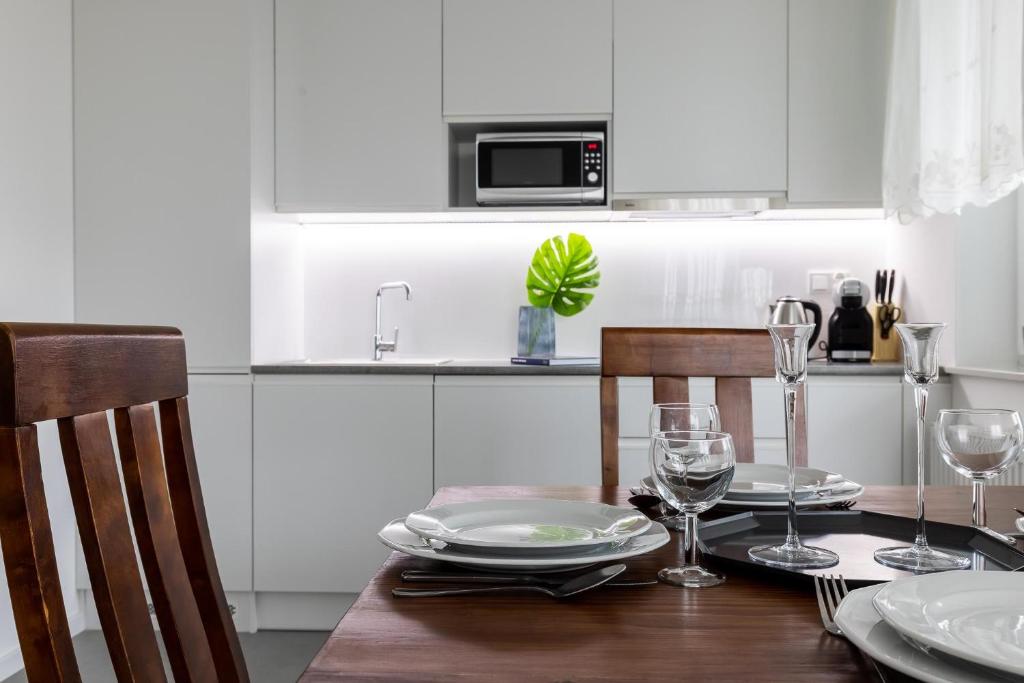 Kuchyňa alebo kuchynka v ubytovaní Symphony Modern Tower Apartamenty