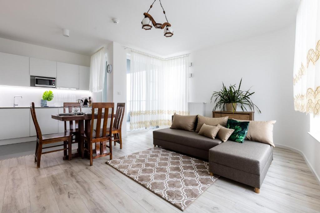 Kuchyňa alebo kuchynka v ubytovaní Symphony Modern Tower Apartamenty