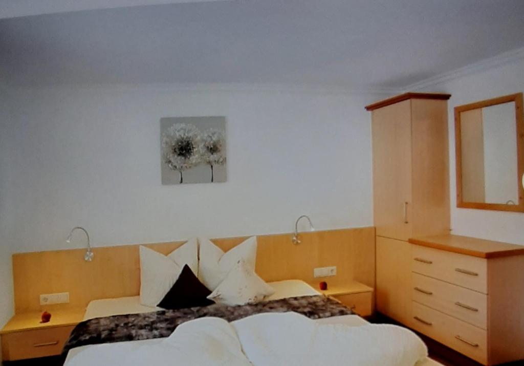 Postel nebo postele na pokoji v ubytování Apart Bergglück incl Sommerkarte