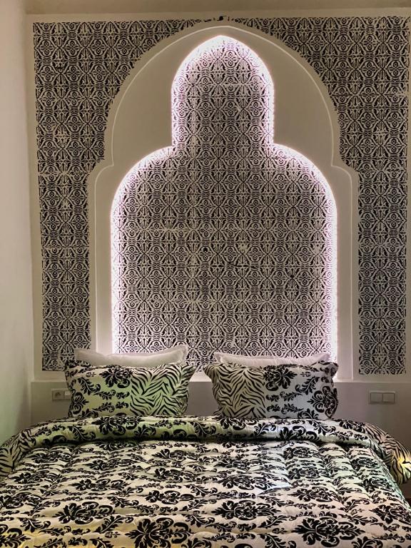 Letto o letti in una camera di Riad Zyna