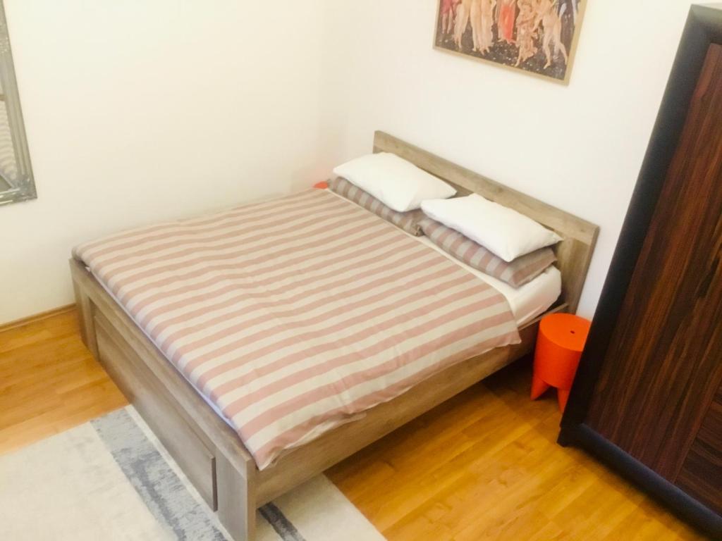 Posteľ alebo postele v izbe v ubytovaní Zamoyskiego