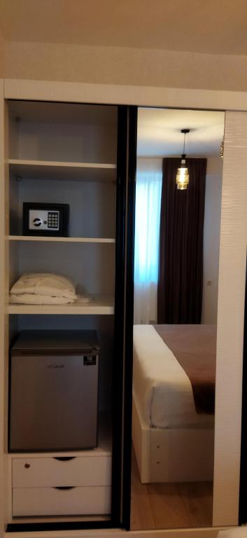 Postel nebo postele na pokoji v ubytování Vere Corner Hotel