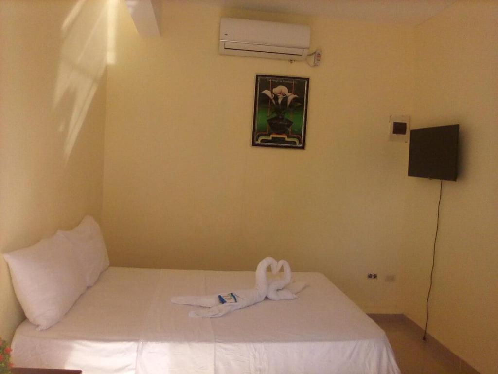 Llit o llits en una habitació de Salemar Hostal - Cerca de la playa