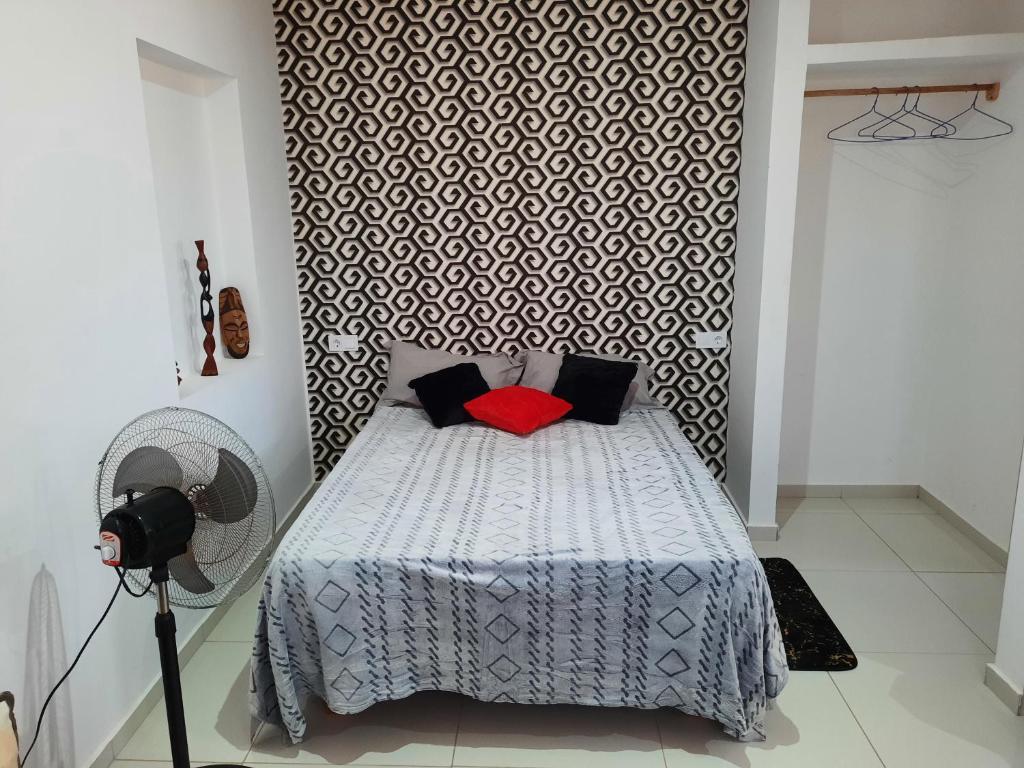 Postel nebo postele na pokoji v ubytování Guest House Maio