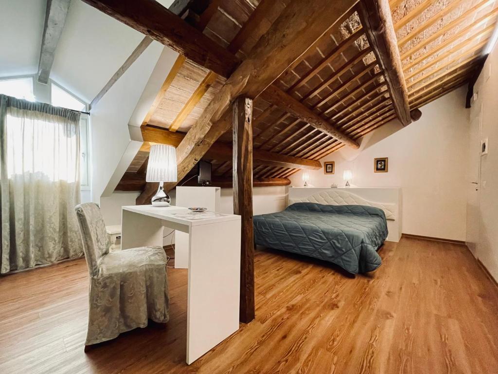 Postel nebo postele na pokoji v ubytování Ca' Settecento "Villa Cavazza Querini"