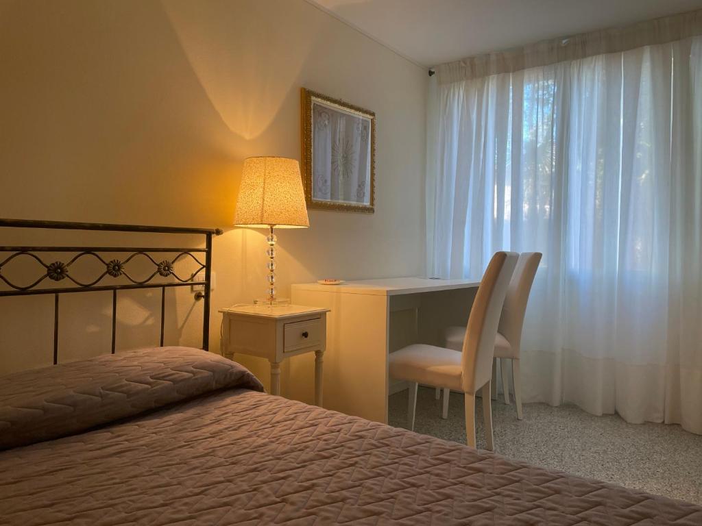 Postel nebo postele na pokoji v ubytování Ca' Settecento "Villa Cavazza Querini"