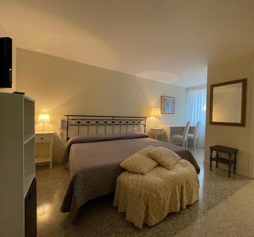 Postel nebo postele na pokoji v ubytování Ca' Settecento "Villa Cavazza Querini"
