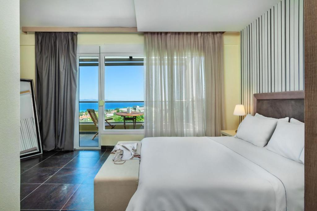 Posteľ alebo postele v izbe v ubytovaní Sunny Villa Grande