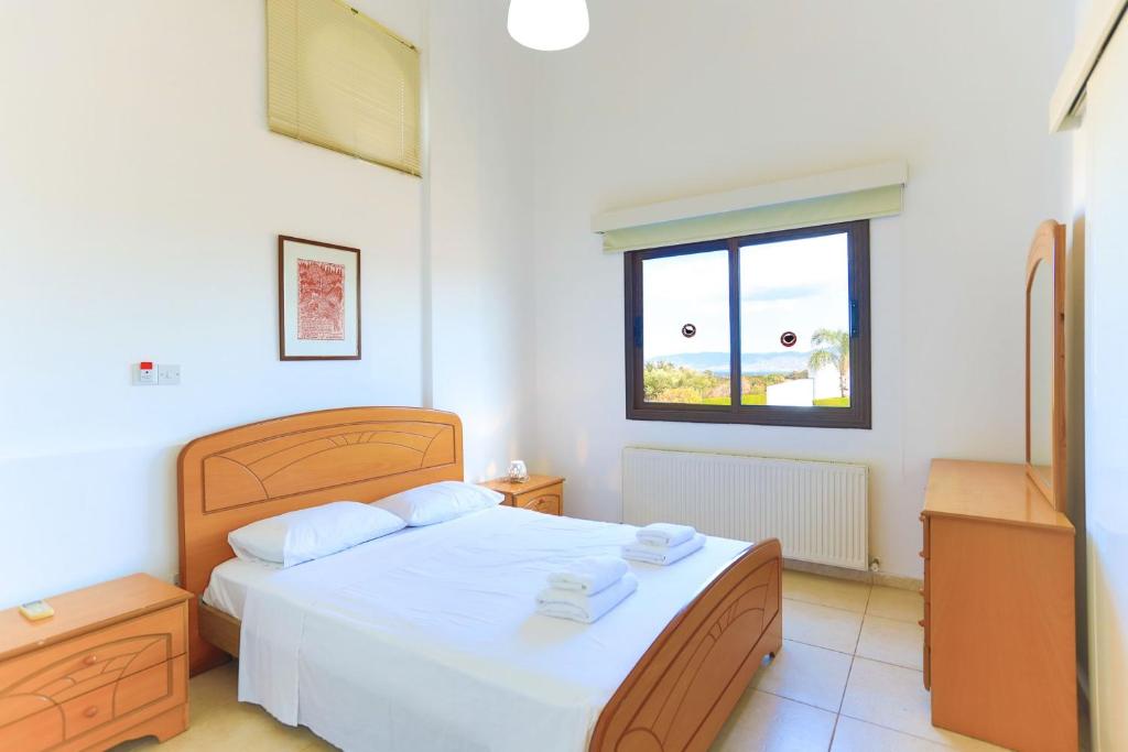 Postel nebo postele na pokoji v ubytování Villa Stavriella