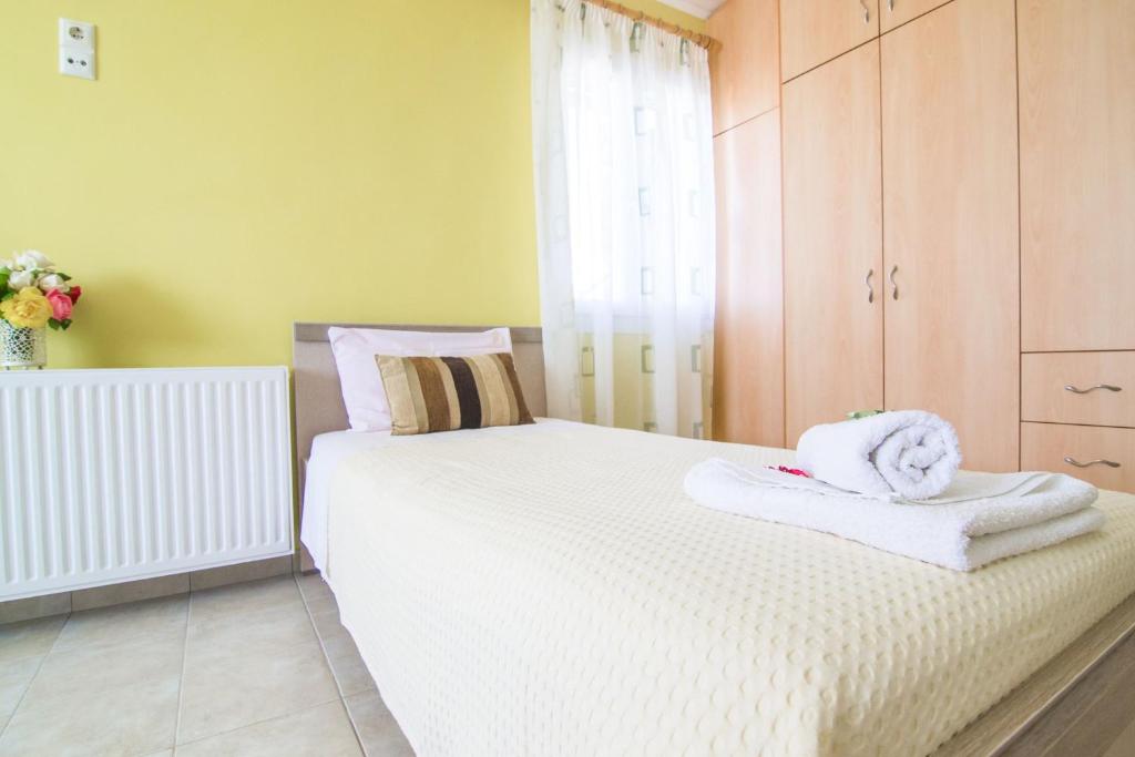 Posteľ alebo postele v izbe v ubytovaní Vista Mare Isavros