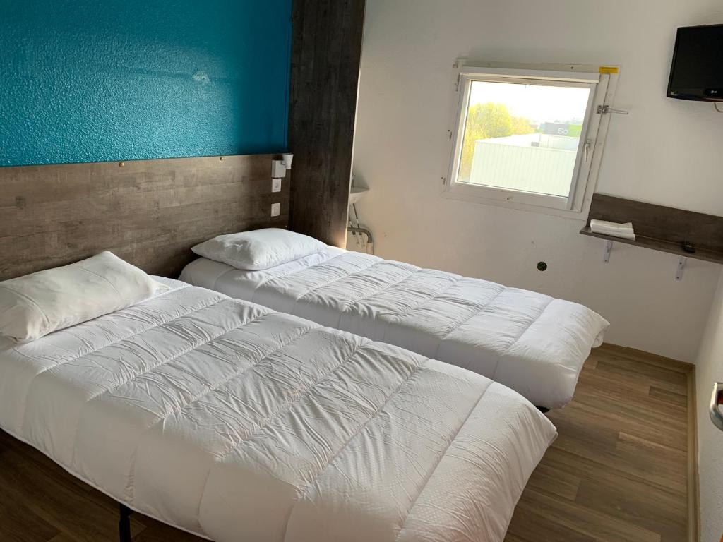 Postel nebo postele na pokoji v ubytování Hôtel Eco Blois -Sud- Vineuil
