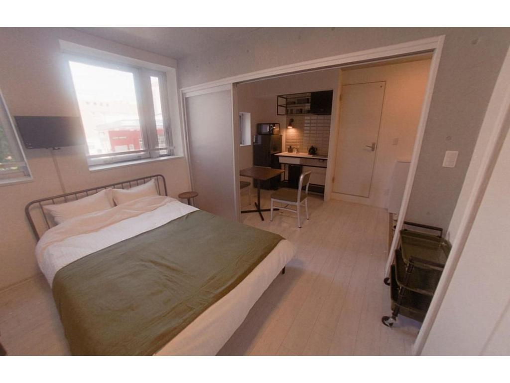 Postel nebo postele na pokoji v ubytování AOCA Kaminoge - Vacation STAY 11981