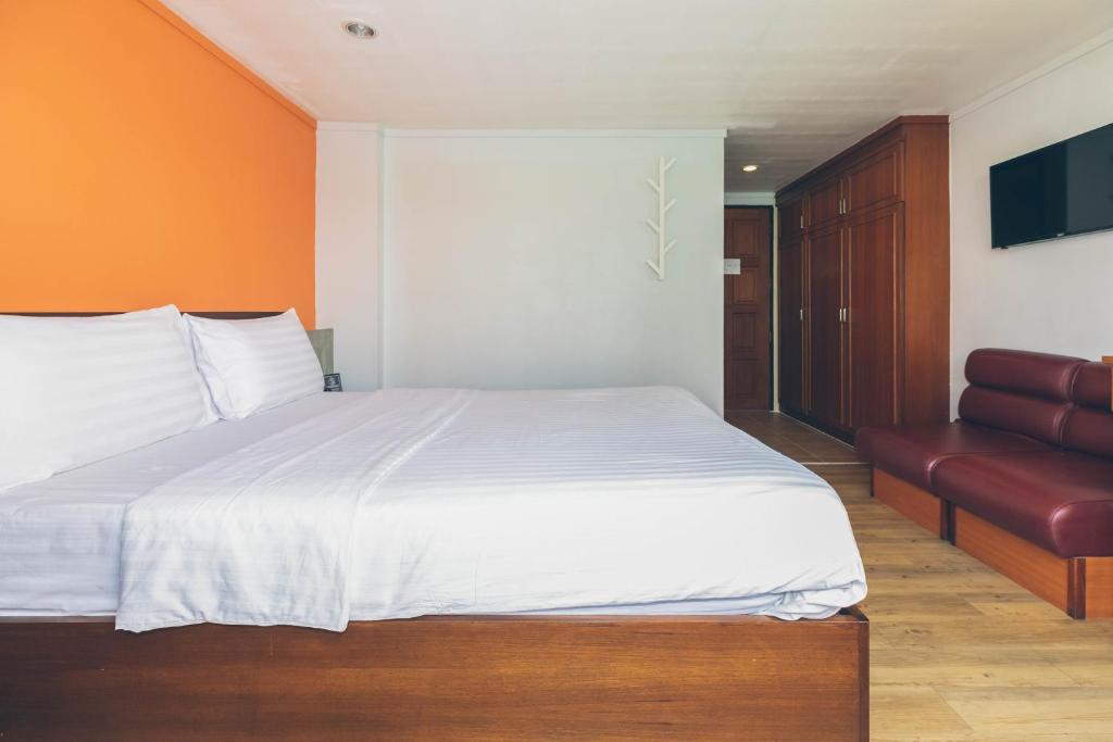 Postel nebo postele na pokoji v ubytování Atlas Bangkok Hotel