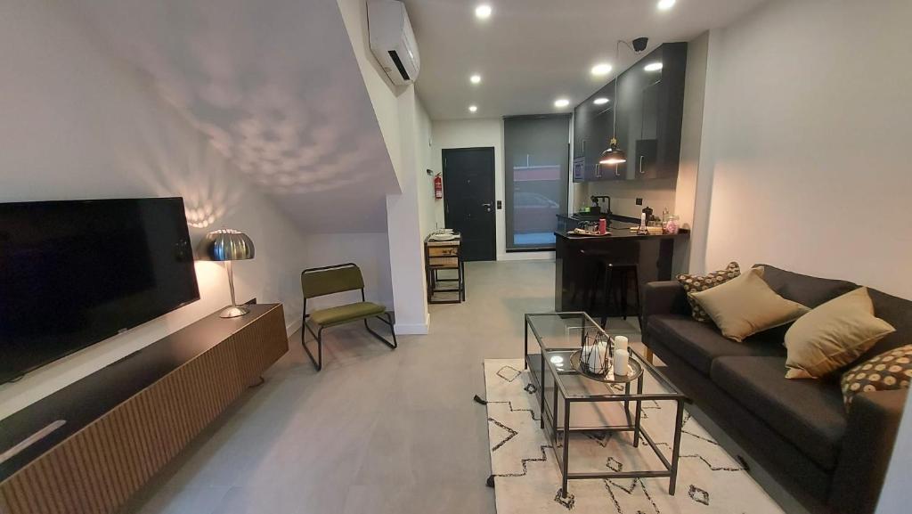 TV a/nebo společenská místnost v ubytování Love Rent4 Málaga Mercedes