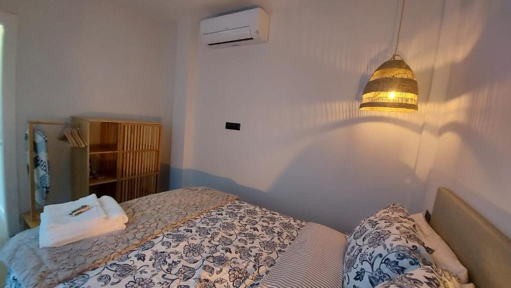 Postel nebo postele na pokoji v ubytování Love Rent4 Málaga Mercedes