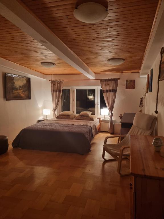 Posteľ alebo postele v izbe v ubytovaní Stylowe poddasze
