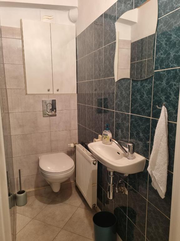 Kúpeľňa v ubytovaní Stylowe poddasze