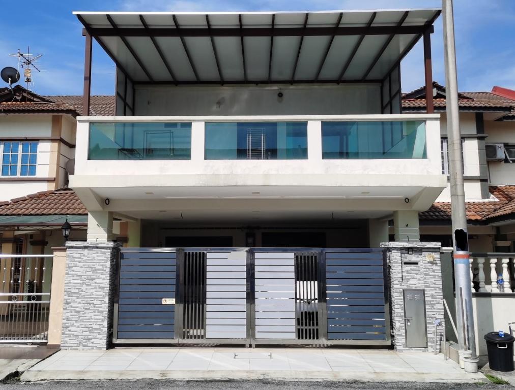 a house with a glass roof on top of it at BBT Double Storey Balcony Bukit Tinggi Home in Klang