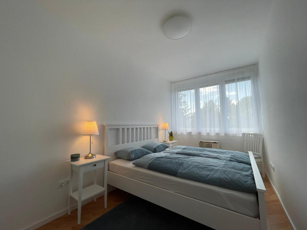 Postel nebo postele na pokoji v ubytování Balaton City Apartment