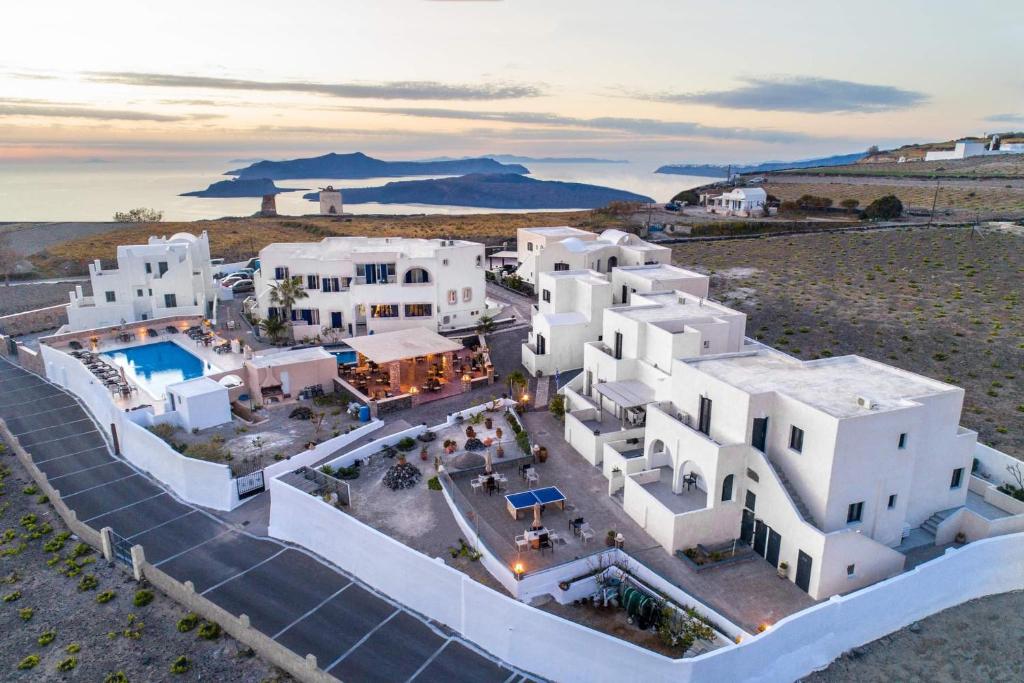 an aerial view of a large white building at Hotel Star Santorini in Megalochori