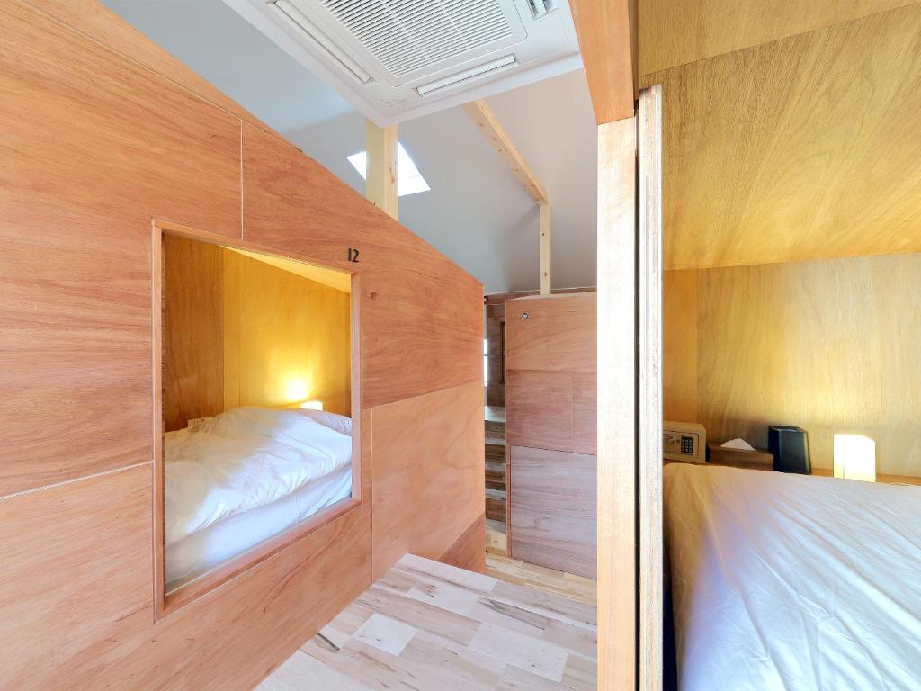 Postel nebo postele na pokoji v ubytování Hostel Sui Kyoto
