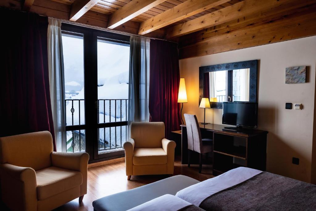 Postel nebo postele na pokoji v ubytování Hotel Valle De Izas