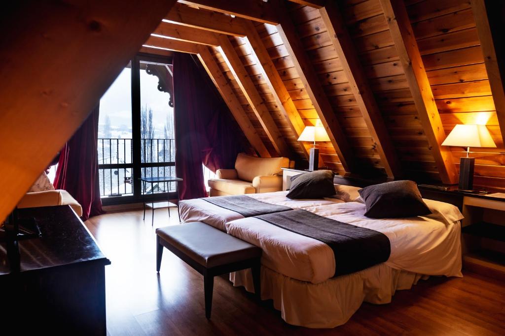 Postel nebo postele na pokoji v ubytování Hotel Valle De Izas