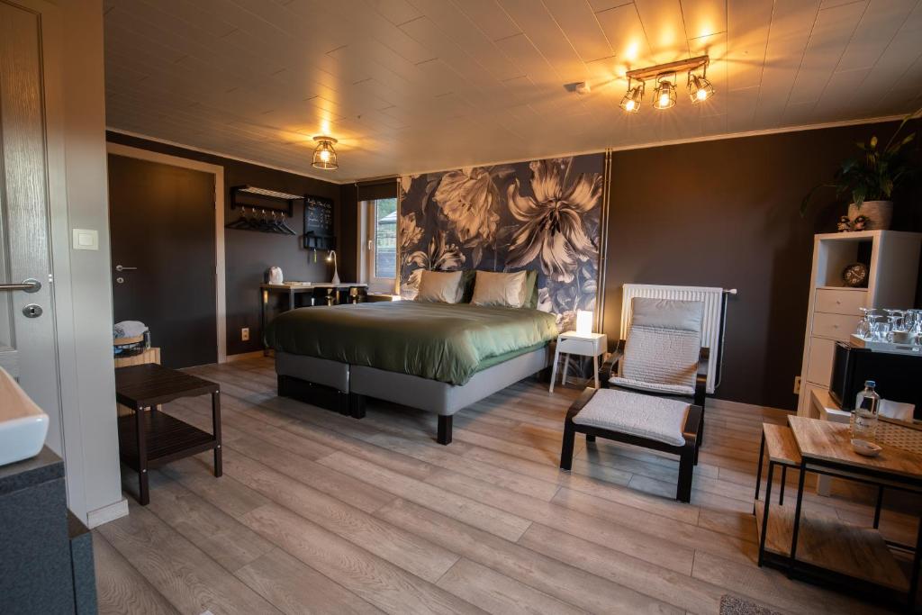 En eller flere senge i et værelse på B&B De Oude Berg