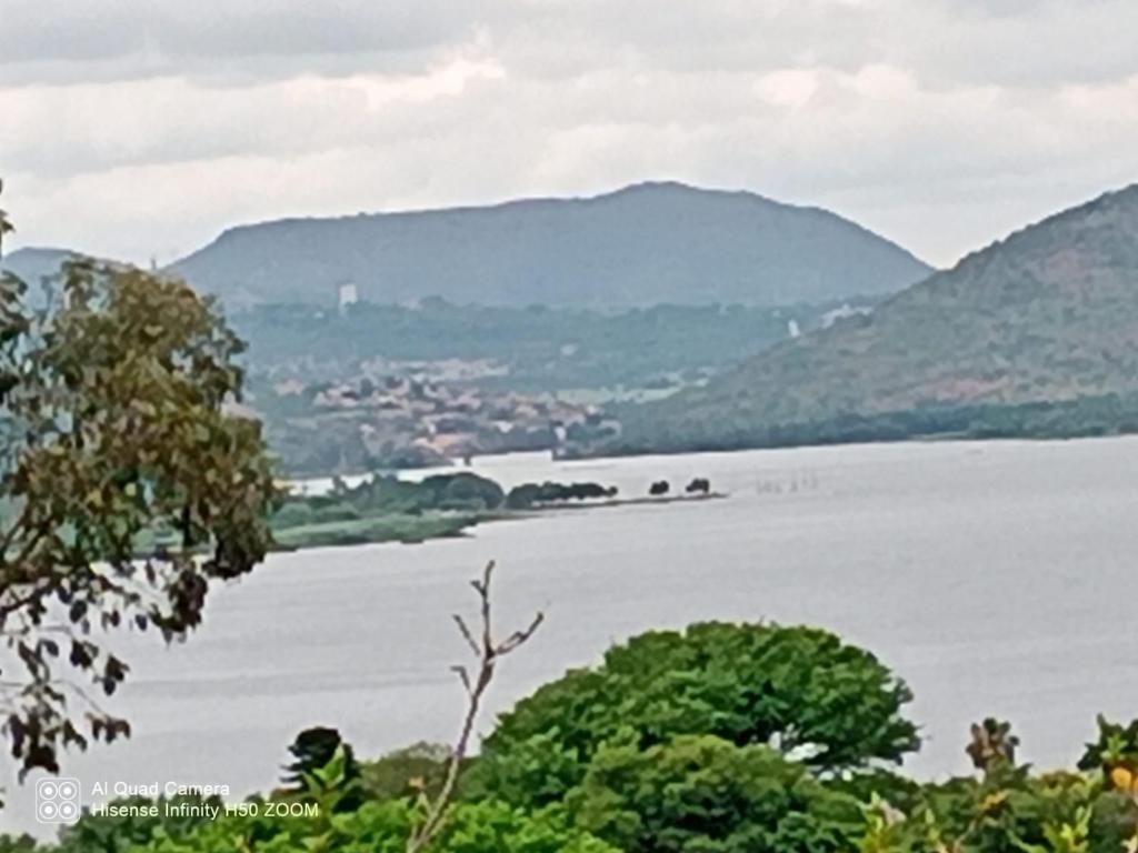 a view of a lake with mountains in the background at THEE VIEW in Hartbeespoort