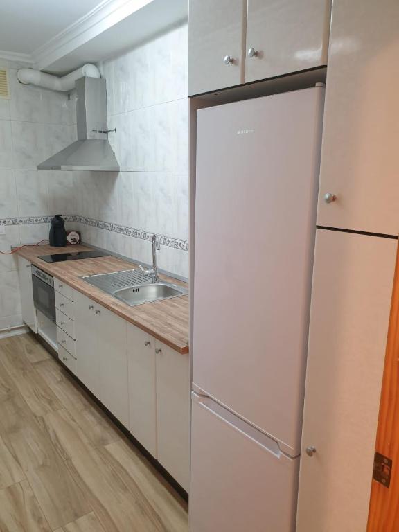 Kuchyň nebo kuchyňský kout v ubytování Urbanlux Lope de Vega
