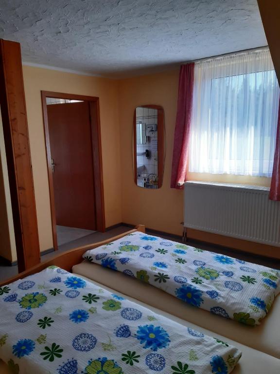 Postel nebo postele na pokoji v ubytování Landpension Heidi Machold